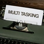 a close up of a typewriter with a paper on it