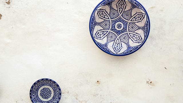 two white-and-blue ceramic dinnerware